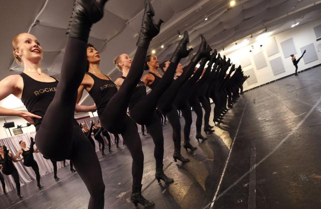 Radio City Rockettes during a press preview October 8, 2026 for the very first behind-the-scenes look at portions of the brand-new scene “Ring” in New York. The tap choreography of “Ring” was created in collaboration with renowned choreographer and tap dancer Chloe Arnold and showcases the versatility of the Rockettes. The 2026 Christmas Spectacular opens on November 4, at Radio City Music Hall. (Photo by TIMOTHY A. CLARY / AFP)