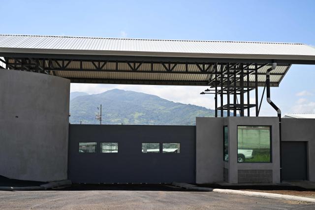 Exterior view of the High-Security Center for Organized Crime Containment (CACCO) in Alajuela, Costa Rica, on October 8, 2026. The mega-prison, modeled after El Salvador's maximum-security CECOT, is scheduled to be inaugurated on October 14, 2026, as Costa Rica seeks to strengthen its response to organized crime. (Photo by Ezequiel BECERRA / AFP)