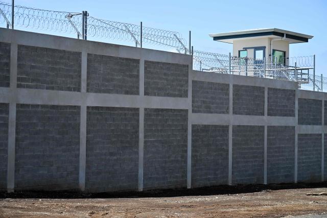 Exterior view of the High-Security Center for Organized Crime Containment (CACCO) in Alajuela, Costa Rica, on October 8, 2026. The mega-prison, modeled after El Salvador's maximum-security CECOT, is scheduled to be inaugurated on October 14, 2026, as Costa Rica seeks to strengthen its response to organized crime. (Photo by Ezequiel BECERRA / AFP)