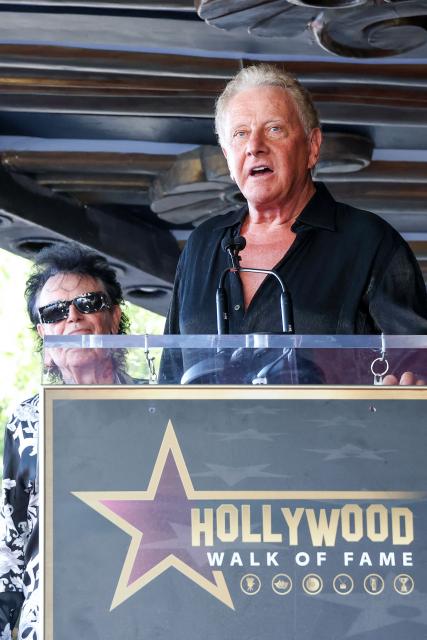 Honoree British singer/songwriter Graham Russell speaks on stage during the Hollywood Walk Of Fame Star ceremony honoring Air Supply on October 8, 2026 in Hollywood, California. (Photo by VALERIE MACON / AFP)