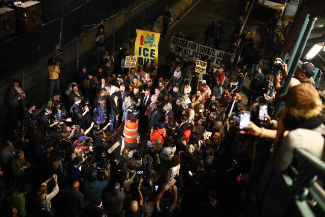 Protesters and elected officals gather near the scene where a man was shot by an Immigration and Customs Enforcement (ICE) officer during an operation in the Bronx borough of New York on October 8, 2026, according to local media and police. (Photo by CHARLY TRIBALLEAU / AFP)