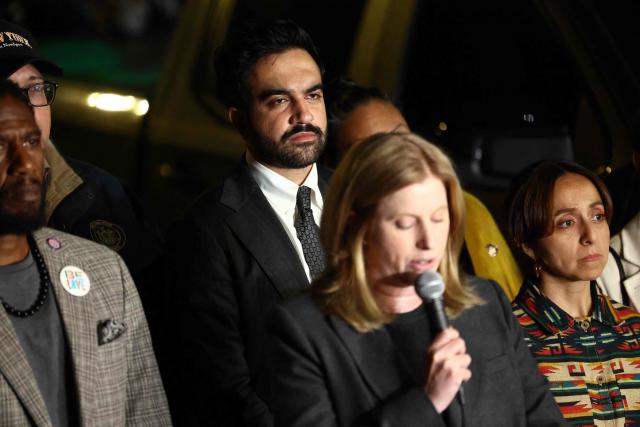 New York City mayor Zohran Mamdani looks on as New York City Police Commissioner Jessica Tisch speaks to the press to give an update about the Immigration and Customs Enforcement (ICE) shooting in the Bronx borough of New York on October 8, 2026. Mayor Zohran Mamdani said he would ask US President Donald Trump to remove federal immigration agents from the city as tensions flared over the latest shooting involving ICE. (Photo by CHARLY TRIBALLEAU / AFP)