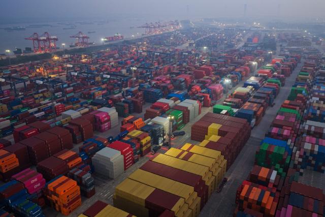 Containers are seen at the container terminal of the port in Nanjing, in China’s eastern Jiangsu province on October 9, 2026. (Photo by CN-STR / AFP) / China OUT