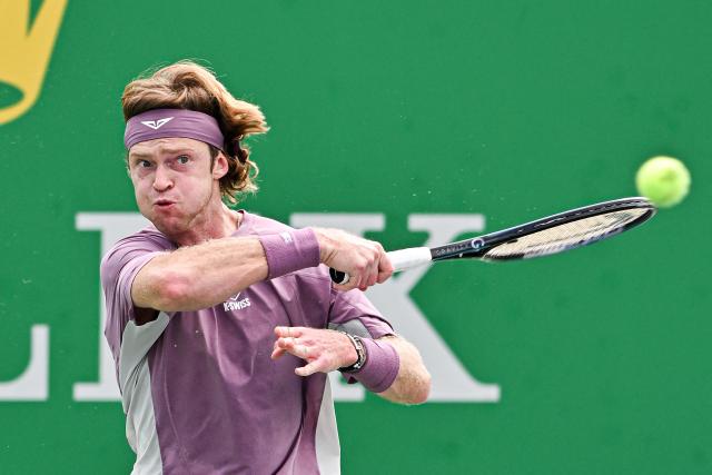 Russia's Andrey Rublev hits a return to Japan's Rei Sakamoto during their men's singles match at the Shanghai Master tennis tournament in Shanghai on October 9, 2026. (Photo by CN-STR / AFP) / China OUT