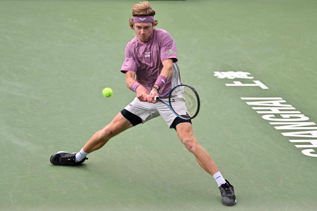 Russia's Andrey Rublev hits a return to Japan's Rei Sakamoto during their men's singles match at the Shanghai Master tennis tournament in Shanghai on October 9, 2026. (Photo by CN-STR / AFP) / China OUT
