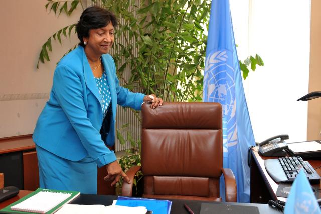 (FILES) New United Nations High Commissioner for Human Rights, South African judge Navanethem (Navi) Pillay poses in her office at the Palais Wilson, headquarters of the specialised UN agency as she takes up her post on Spetember 1, 2008 in Geneva. The Nobel Peace Prize was on October 9, 2026, awarded to South Africa's Navi Pillay, a human rights champion who headed the Rwanda genocide tribunal and last year accused Israel of genocide in Gaza, the prize committee said. (Photo by Fabrice COFFRINI / AFP)