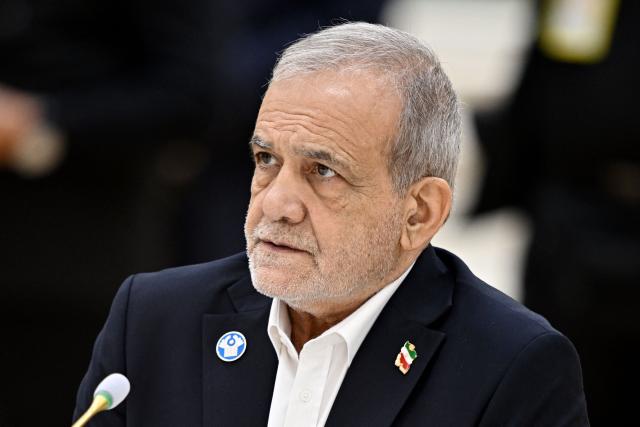 In this pool photograph distributed by the Russian state agency Sputnik, Iranian President Masoud Pezeshkian attends a meeting of the Commonwealth of Independent States (CIS) Heads of State Council in Turkmenbashi on October 9, 2026. (Photo by Sergei BOBYLYOV / POOL / AFP)