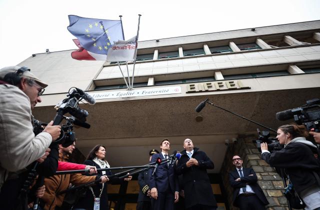 France's Education Minister Edouard Geffray (L) listens to Headteacher Antoine Milovanovic during a visit at the high school Lycee Polyvalent de Cachan, in Cachan, on the outskirts of Paris on October 9, 2026, on the sidelines of a nationwide protest movement of students over learning conditions. (Photo by SIMON WOHLFAHRT / AFP)