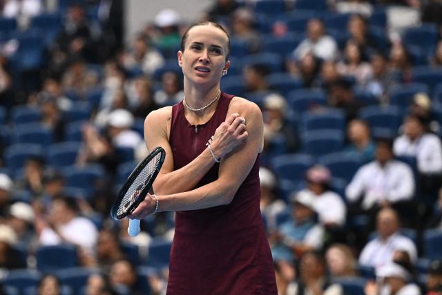 Ukraine’s Elina Svitolina reacts during her women’s singles quarter-final match against China’s Zheng Qinwen at the China Open tennis tournament in Beijing on October 9, 2026. (Photo by Pedro PARDO / AFP)