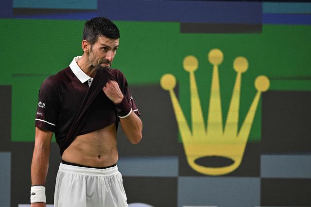 Serbia's Novak Djokovic reacts after a point during his match against Poland's Hubert Hurkacz during their men's singles match at the Shanghai Masters tennis tournament in Shanghai on October 9, 2026. (Photo by Hector RETAMAL / AFP)