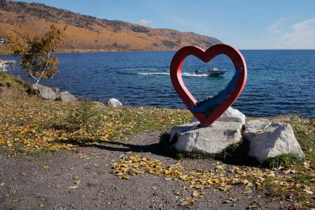 A motorboat moves on Lake Baikal, the world's deepest lake, in the Irkutsk region on October 7, 2026. (Photo by TATYANA MAKEYEVA / AFP)