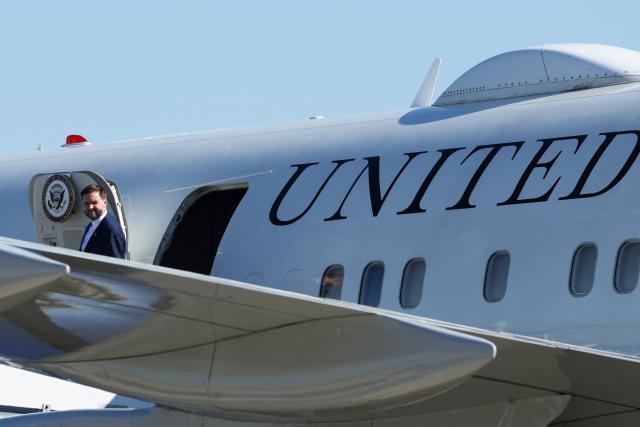 US Vice President JD Vance departs Air Force Two as he arrives at Cincinnati/Northern Kentucky International Airport on October 9, 2026 in Hebron, Kentucky. Vance is campaigning for several Republican candidates on the November ballot. (Photo by Samuel Corum / POOL / AFP)