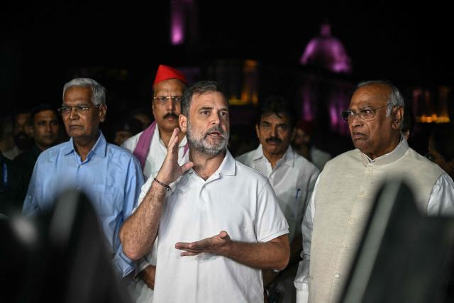 India's Congress party leader Rahul Gandhi (C) along with leaders of the opposition alliance INDIA bloc (Indian National Developmental Inclusive Alliance) speaks with media outside the Presidential Palace as they demand the resignation of India’s Chief Election Commissioner over alleged "special intensive revision” (SIR) voter-roll irregularities in New Delhi on October 9, 2026. (Photo by Arun SANKAR / AFP)