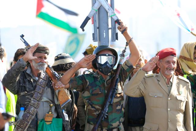 Supporters of the Houthi authorities gather during a protest against the Saudi intervention in Yemen, in Sanaa, on October 9, 2026. The Houthis, who are fighting the Saudi-backed, internationally recognised government, seized the coastline alongside crucial trade route during a lightning offensive last month, extending their control over all of Yemen's Red Sea coast. Yemeni government forces have been attempting for several days to retake coastal territory captured by the pro-Iranian fighters. (Photo by Mohammed HUWAIS / AFP)