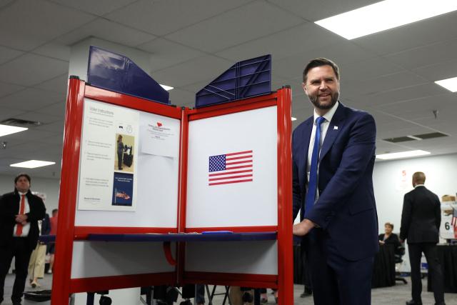 US Vice President JD Vance fills out his ballot during early voting at the Hamilton County Board of Elections on October 9, 2026 in Norwood, Ohio. (Photo by Samuel Corum / POOL / AFP)