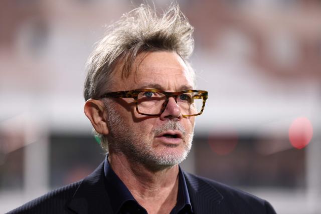 French former football manager, former Japan national team coach, Philippe Troussier looks on prior to the women's international friendly football match between Haiti and Japan at the Bauer Stadium in Saint-Ouen, north of Paris, on October 9, 2026. (Photo by FRANCK FIFE / AFP)