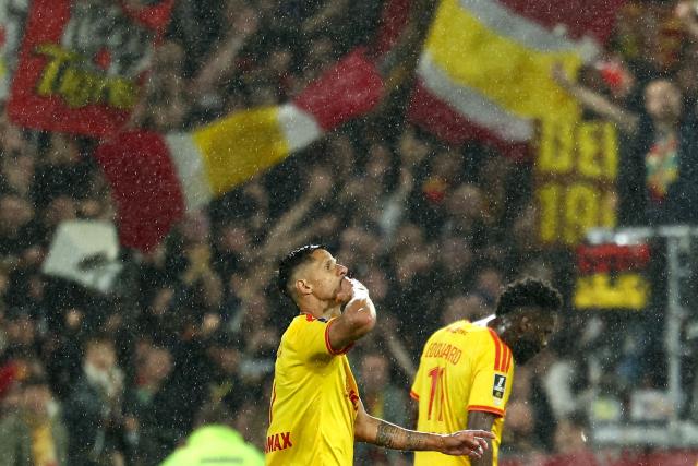 Lens' French forward #07 Florian Sotoca celebrates scoring the opening goal during the French L1 football match between RC Lens and Olympique Lyonnais (OL) at the Stade Bollaert-Delelis in Lens, northern France, on October 9, 2026. (Photo by Sameer AL-DOUMY / AFP)