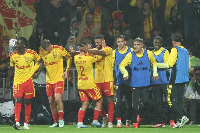 Lens' French defender #14 Matthieu Udol celebrates scoring his team's second goal during the French L1 football match between RC Lens and Olympique Lyonnais (OL) at the Stade Bollaert-Delelis in Lens, northern France, on October 9, 2026. (Photo by Sameer AL-DOUMY / AFP)