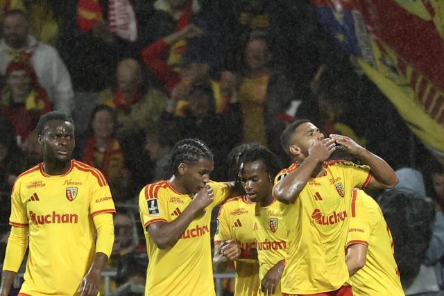 Lens' French defender #14 Matthieu Udol celebrates scoring his team's second goal during the French L1 football match between RC Lens and Olympique Lyonnais (OL) at the Stade Bollaert-Delelis in Lens, northern France, on October 9, 2026. (Photo by Sameer AL-DOUMY / AFP)