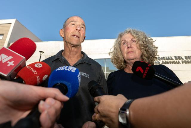 Debra (R) and Martin (L) Robinson, the parents of Australian brothers Callum and Jake Robinson, who were murdered during a surfing trip in April 2024, speak at the end of the trial of three murder suspects were found guilty in Ensenada, Baja California state, Mexico, on October 9, 2026. A Mexican judge is expected to deliver a verdict on October 9 in the high-profile trial of three men accused of murdering two Australian surfers and their US friend in 2024. (Photo by Guillermo Arias / AFP)