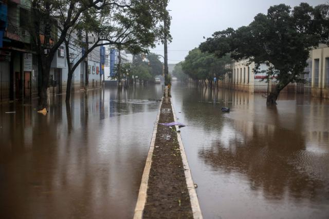 (FILES) A flooded street is seen in Porto Alegre, Rio Grande do Sul State, Brazil, on May 24, 2024. Brazilian prosecutors on October 9, 2026, filed an unprecedented lawsuit against oil giant Shell's subsidiary in the country, demanding $108 million in compensation over deadly 2024 floods. (Photo by Anselmo Cunha / AFP)