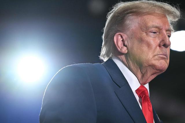 US President Donald Trump looks on at a campaign rally at the Oncenter Convention Center in Syracuse, New York, on October 9, 2026. President Trump is campaigning for Republican nominee for New York governor, Bruce Blakeman, as well as other Republican candidates in November's general election. (Photo by Mandel NGAN / AFP)