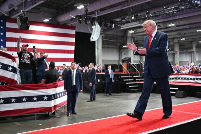 US President Donald Trump walks off stage after speaking at a campaign rally at the Oncenter Convention Center in Syracuse, New York, on October 9, 2026. President Trump is campaigning for Republican nominee for New York governor, Bruce Blakeman, as well as other Republican candidates in November's general election. (Photo by Mandel NGAN / AFP)