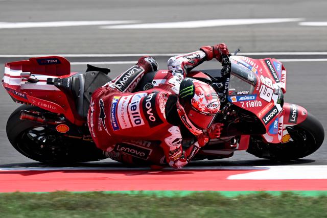 Ducati Lenovo Team's Italian rider Francesco Bagnaia rides during the qualifying session ahead of the MotoGP Indonesian Grand Prix at the Mandalika International Circuit in Mandalika on October 10, 2026. (Photo by SONNY TUMBELAKA / AFP)