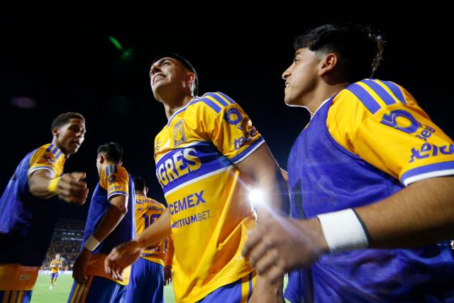 Tigres' Argentine midfielder #11 Juan Brunetta (C) celebrates scoring his team's third goal during the Liga MX Apertura tournament football match between Tigres and Toluca at Universitario de la UANL stadium in San Nicolas de los Garza, Nuevo Leon state, Mexico, on October 9, 2026. (Photo by Julio Cesar AGUILAR / AFP)