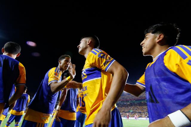 Tigres' Argentine midfielder #11 Juan Brunetta (C) celebrates scoring his team's third goal during the Liga MX Apertura tournament football match between Tigres and Toluca at Universitario de la UANL stadium in San Nicolas de los Garza, Nuevo Leon state, Mexico, on October 9, 2026. (Photo by Julio Cesar AGUILAR / AFP)