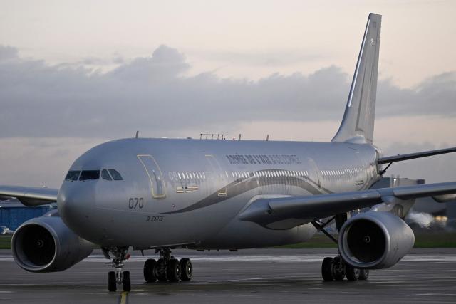 A French Air and Space Force Airbus A330 MRTT, with European Space Agency (ESA) French astronaut Sophie Adenot onboard,  arrives at the Military Airport in Cologne, in the early hours of the morning on October 10, 2026, the day after she and three colleagues splashed down in the Pacific Ocean returning from their mission at the International Space Station (ISS). Sophie Adenot became the first French female astronaut to venture outside the International Space Station (ISS) for a spacewalk in late August 2026. (Photo by INA FASSBENDER / AFP)
