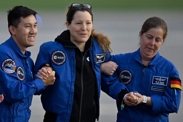 European Space Agency (ESA) French astronaut Sophie Adenot (C) arrives at the Military Airport in Cologne on October 10, 2026, the day after she and three colleagues splashed down in the Pacific Ocean returning from their mission at the International Space Station (ISS). Sophie Adenot became the first French female astronaut to venture outside the International Space Station (ISS) for a spacewalk in late August 2026. (Photo by INA FASSBENDER / AFP)