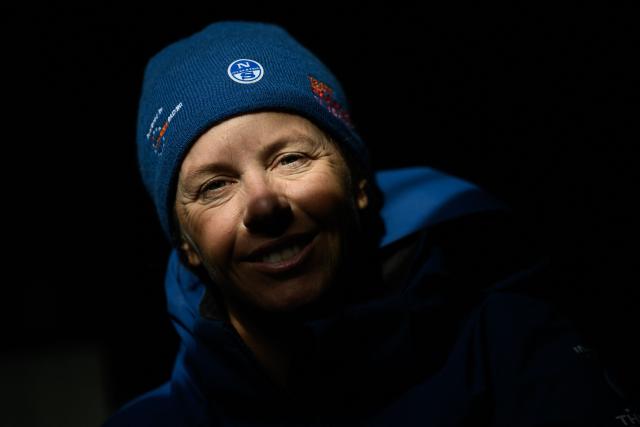 US Italian skipper Francesca Clapcich poses while sailing her Imoca monohull 11h Hour Racing during a training session ahead of the Route du Rhum solo sailing race from Saint-Malo, western France to Pointe-a-Pitre in the French overseas island of Guadeloupe, off Lorient on September 26, 2026. (Photo by Loic VENANCE / AFP)