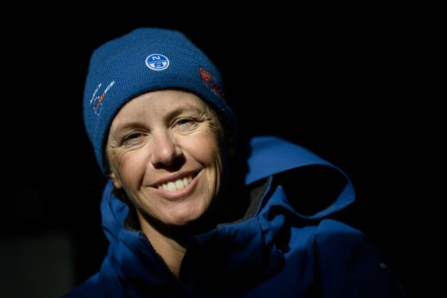 US Italian skipper Francesca Clapcich poses while sailing her Imoca monohull 11h Hour Racing during a training session ahead of the Route du Rhum solo sailing race from Saint-Malo, western France to Pointe-a-Pitre in the French overseas island of Guadeloupe, off Lorient on September 26, 2026. (Photo by Loic VENANCE / AFP)