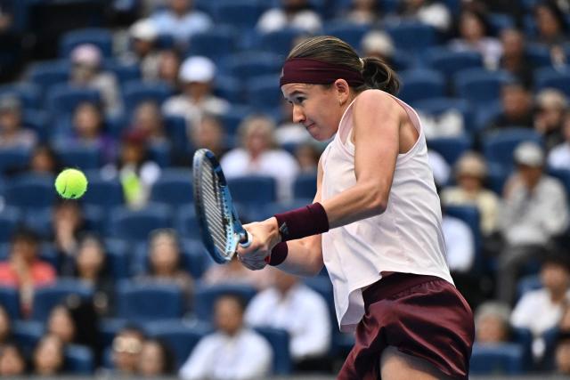 Czech Republic’s Nikola Bartunkova hits a return to Russia’s Mirra Andreeva during their women’s singles semi-final match at the China Open tennis tournament in Beijing on October 10, 2026. (Photo by Pedro PARDO / AFP)