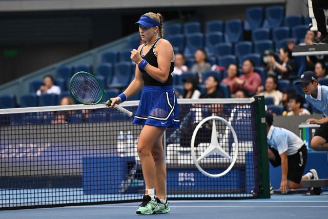 Russia’s Mirra Andreeva reacts during her women’s singles semi-final match against Czech Republic's Nikola Bartunkova at the China Open tennis tournament in Beijing on October 10, 2026. (Photo by Pedro PARDO / AFP)