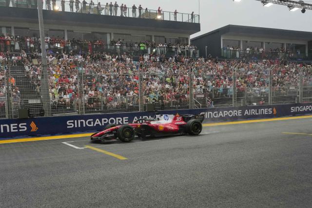 Ferrari's Monegasque driver Charles Leclerc drives during the sprint race ahead of the Formula One Singapore Grand Prix at the Marina Bay Street Circuit in Singapore on October 10, 2026. (Photo by Ng Han Guan / AFP)