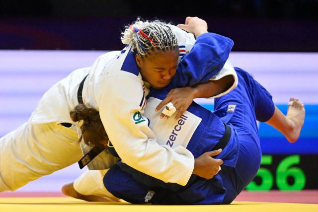 France's Romane Dicko (white) competes against Croatia's Helena Vukovic in the women's over 78 kg quarter-final at the World Judo Championships in Baku on October 10, 2026. (Photo by Alexander NEMENOV / AFP)