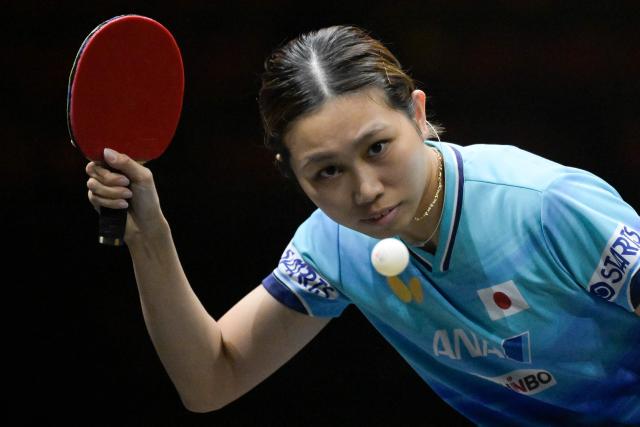 Japan's Hitomi Sato hits a return to China's Chen Xingtong during their women's table tennis singles semifinal match at the China Smash Table Tennis 2026 tournament in Beijing on October 10, 2026. (Photo by WANG Zhao / AFP)