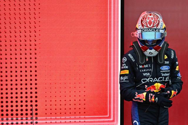 Red Bull Racing's Dutch driver Max Verstappen celebrates winning the sprint race ahead of the Formula One Singapore Grand Prix at the Marina Bay Street Circuit in Singapore on October 10, 2026. (Photo by ANTHONY WALLACE / AFP)