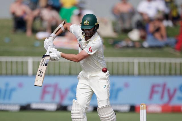 Australia's Josh Hazlewood plays a shot on day two of the first Test match between South Africa and Australia at the Kingsmead stadium in Durban on October 10, 2026. (Photo by Marco Longari / AFP)