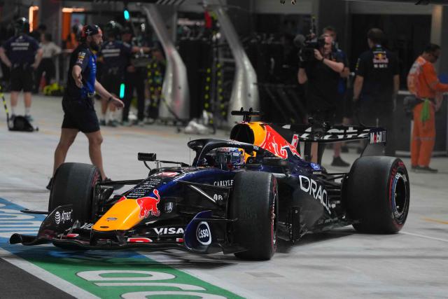 Red Bull Racing's Dutch driver Max Verstappen drives out of the pit lane during the qualifying session ahead of the Formula One Singapore Grand Prix at the Marina Bay Street Circuit in Singapore on October 10, 2026. (Photo by Ng Han Guan / POOL / AFP)