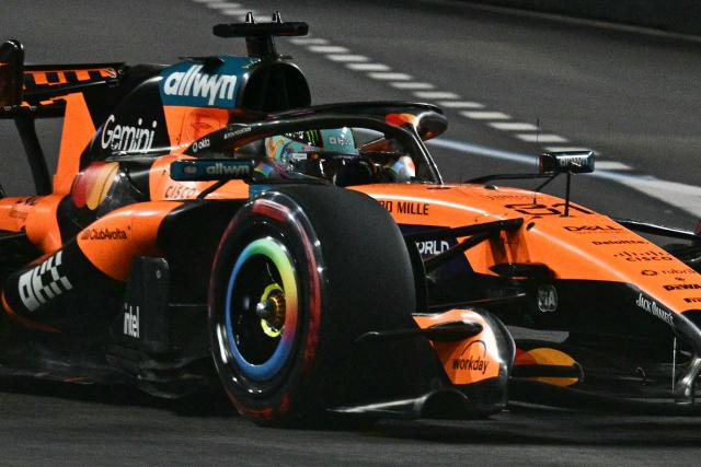 McLaren's Australian driver Oscar Piastri drives during the qualifying session ahead of the Formula One Singapore Grand Prix at the Marina Bay Street Circuit in Singapore on October 10, 2026. (Photo by ANTHONY WALLACE / AFP)