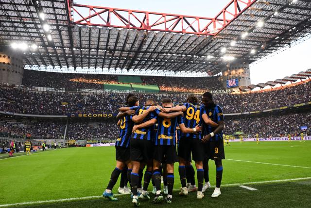 Inter Milan's Croatian midfielder #8 Petar Sucic (C) celebrates with teammates after scoring a goal during the Italian Serie A football match between Inter Milan and Parma at the San Siro Stadium in Milan, on October 10, 2026. (Photo by Piero CRUCIATTI / AFP)