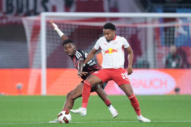 Frankfurt's Nigerian midfielder #25 Raphael Onyedika (L) and Leipzig's French forward #28 Christopher Nkunku vie for the ball during the German first divison Bundesliga football match between RB Leipzig and Eintracht Frankfurt in Leipzig, eastern Germany on October 10, 2026. (Photo by Ronny HARTMANN / AFP) / DFL REGULATIONS PROHIBIT ANY USE OF PHOTOGRAPHS AS IMAGE SEQUENCES AND/OR QUASI-VIDEO