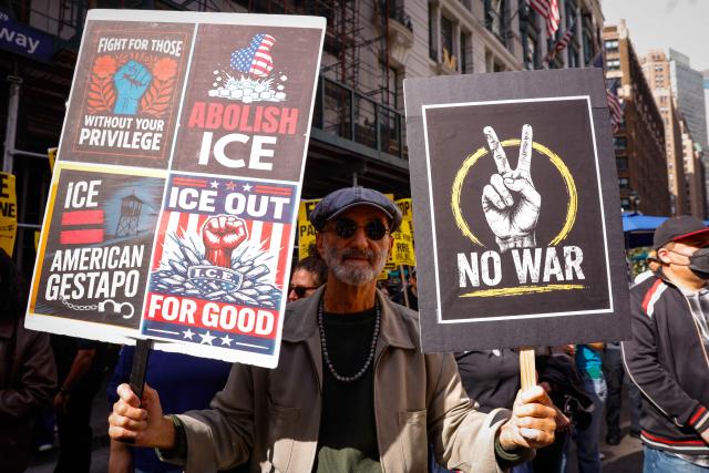 People protest against ICE (US Immigration and Customs Enforcement) in New York City on October 10, 2026. Immigration and Customs Enforcement (ICE) officers shot a Dominican man on October 8 in an incident that has provoked a showdown between the city's Democratic mayor and the Trump administration.  Oscar Bergal, 28, was wounded in the neck during an ICE operation in the Bronx on Thursday, while a five-year-old child who was in his car at the time was physically unharmed. (Photo by kena betancur / AFP)