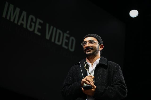 Journalist Cyril Theophilos receives the video image prize of the international jury, Prix ARTE, France Medias Monde, France Televisions for the report "Vengeance: soldats israeliens au service des colons en Cisjordanie" (Revenge: Israeli soldiers at the service of settlers in the West Bank) for CNN during the award ceremony of the 2026 edition of the "Prix Bayeux Calvados-Normandie of the war correspondants", in Bayeux, northwestern France, on October 10, 2026. (Photo by Guillaume Saligot / AFP)