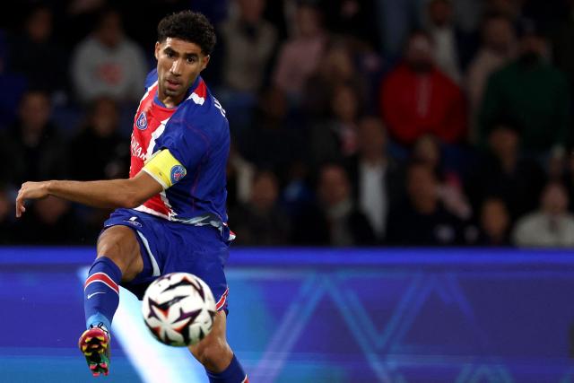 PSG's Moroccan defender #02 Achraf Hakimi shoots towards goal during the French L1 football match between Paris Saint-Germain (PSG) and Le Mans FC at the Parc des Princes stadium in Paris on October 10, 2026. (Photo by FRANCK FIFE / AFP)