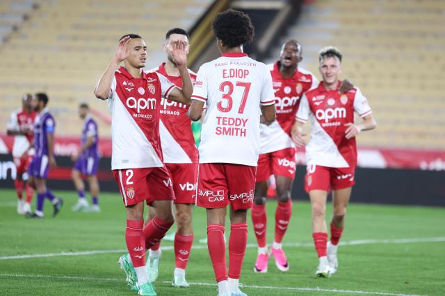 Monaco's French midfielder #37 Edan Diop celebrates with team mates after scoring a goal during the French L1 football match between AS Monaco and Toulouse FC at the Stade Louis II in Monaco on October 10, 2026. (Photo by Valery HACHE / AFP)