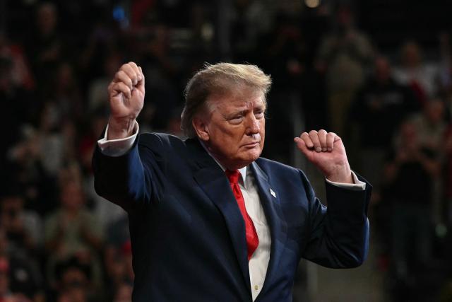 US President Donald Trump dances after concluding his remarks during a campaign rally at F&M Bank Arena in Clarksville, Tennessee on October 10, 2026. Trump is campaigning for Republican candidates ahead of the November 3 midterm election. (Photo by Mandel NGAN / AFP)